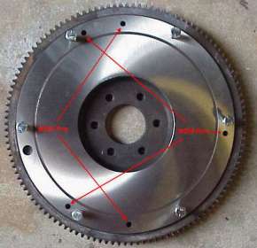flywheel drilled for 2 or 3 alignment pins