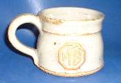 Ceramic mug with MG logo