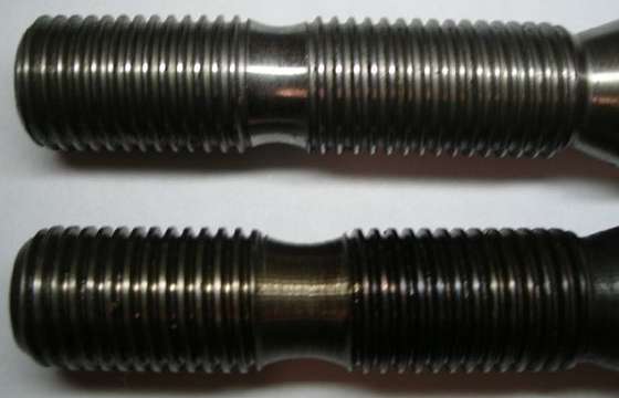 Two swivel pins compared