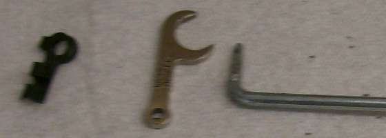 SU Wrench, rod end clip, and bent rod