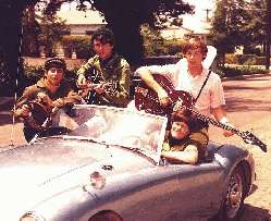 The Monkees in an MGA