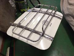 Luggage carrier with tire rack added